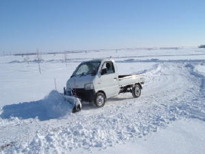 Picture of 93 Suzuki Carry plowing snow